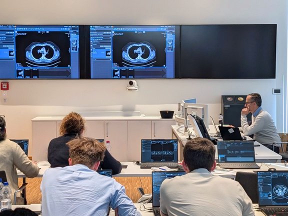 Participants at the RECIST and Beyond workshop in Cologne during hands-on training with mint Lesion for structured tumor response assessment.