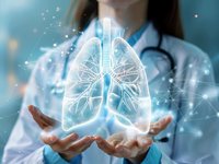 Image of a female doctor holding a hologram of a lung